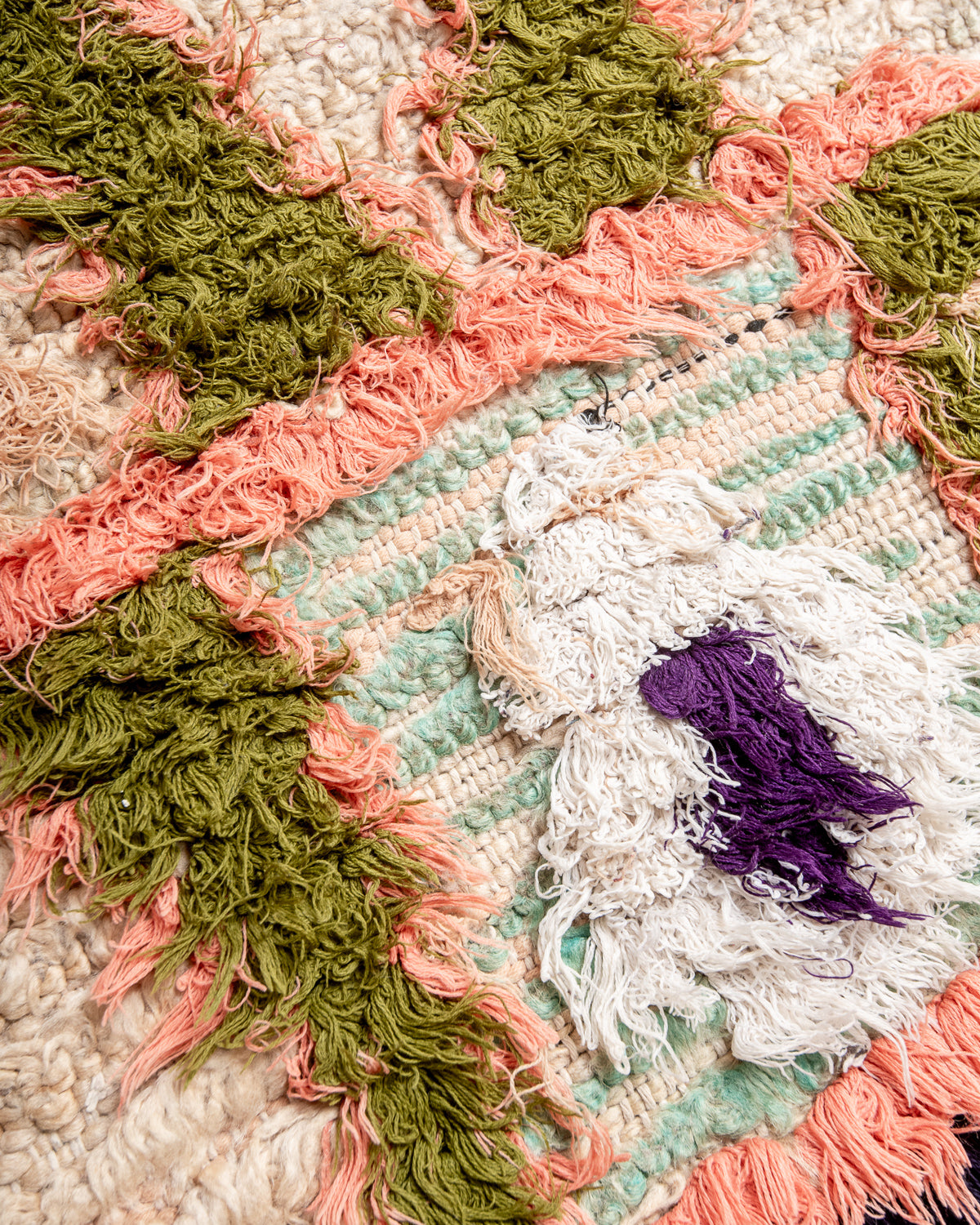 Modern designer vintage handcrafted Berber rug from Morocco. Boucherouite runner rug with beautiful colors and patterns.